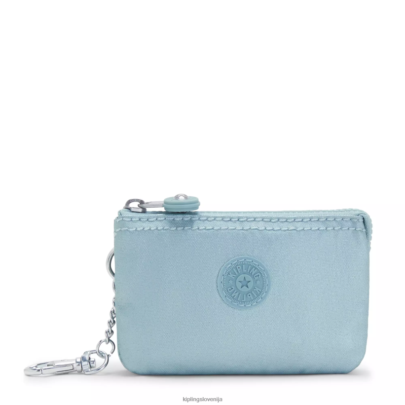 kipling_v4x2b608_biserno_modra_kovinska_creativity_mini_torbica_kovinski_obesek_za_kljuce_zenske_obeski_za_kljuce.png Kipling V4X2B608 biserno modra kovinska creativity mini torbica kovinski obesek za ključe ženske obeski za ključe - slika 1
