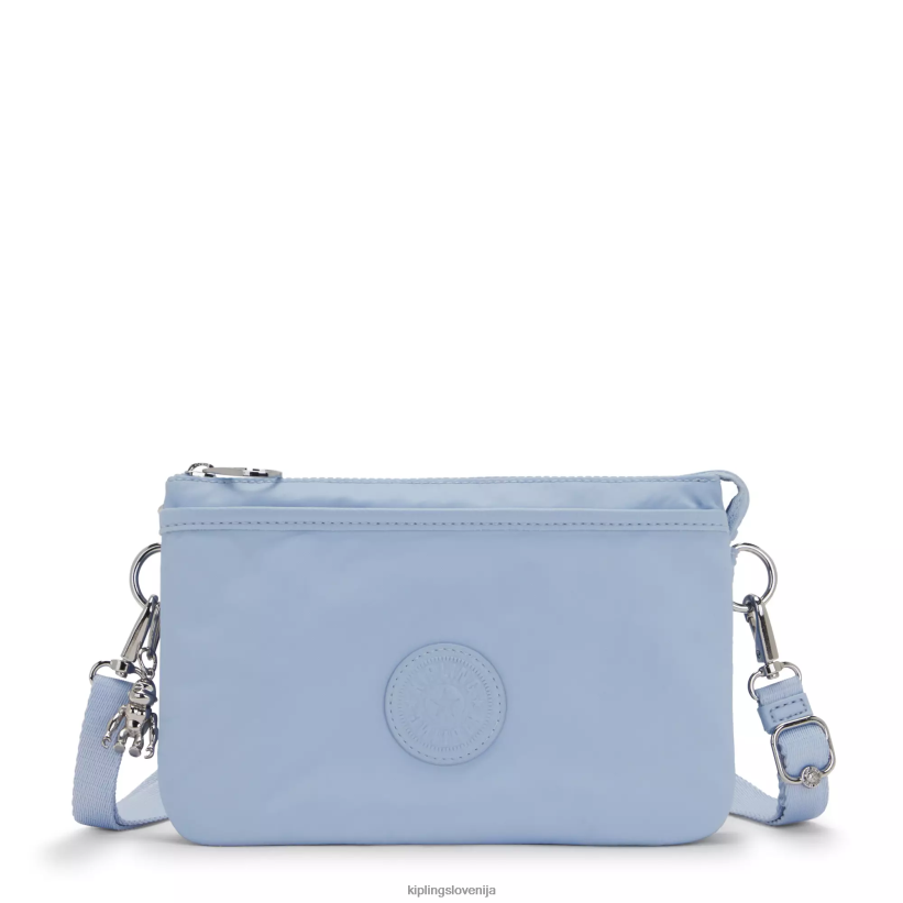 kipling_v4x2b64_bledece_nebo_riri_torba_za_cez_ramo_zenske_torbice_za_cez_ramo.png Kipling V4X2B64 bledeče nebo riri torba za čez ramo ženske torbice za čez ramo - slika 1